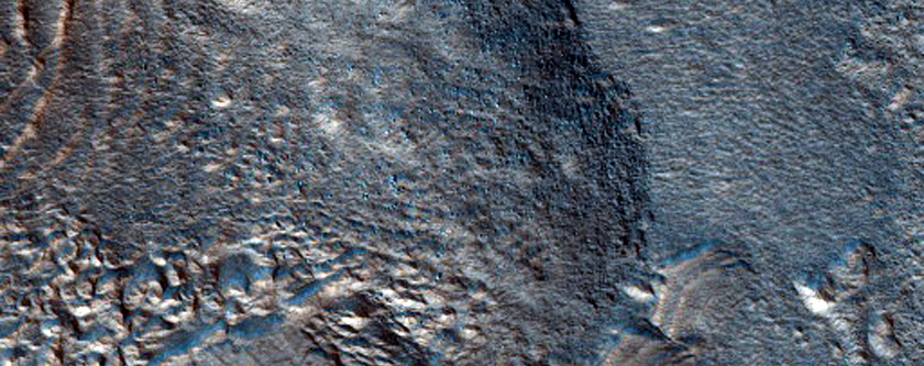 Dipping Layers Against Mound in Deuteronilus Mensae
