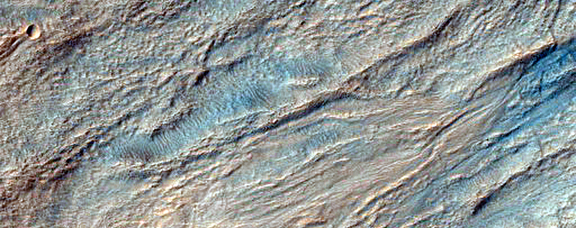 Monitor Gullied Slopes of Impact Crater
