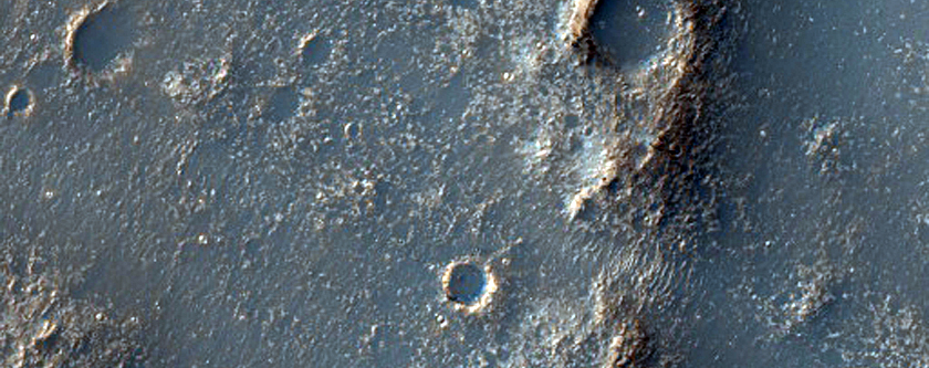 Possible Flow Material at Bakhuysen Crater Rim
