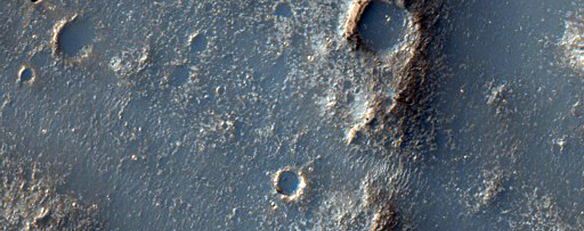 Possible Flow Material at Bakhuysen Crater Rim
