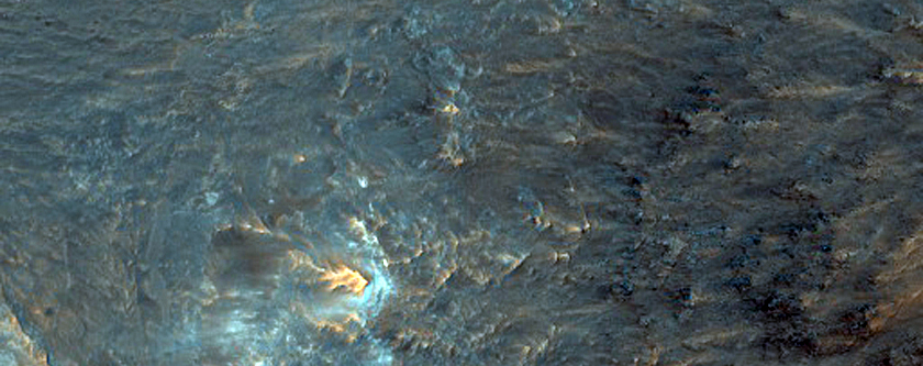 Eastern Rim of Crater in Tyrrhena Terra with Possible Olivine Signature
