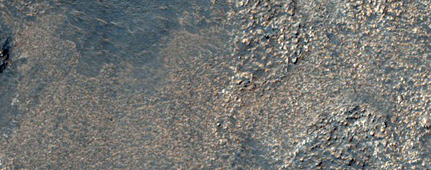 Possible Aqueous Sediments in Hellas Planitia
