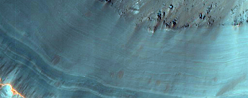Craters Revealing Fan Stratigraphy in Saheki Crater