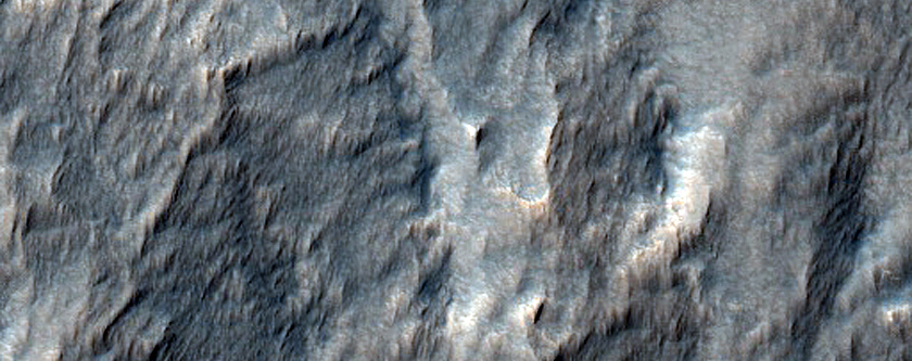Pit in Mid-Latitude Mantle
