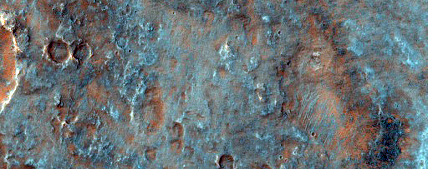Flat-Topped and Mare-Type Ridges on Thaumasia Planum
