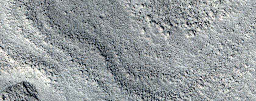 Debris Flow around Obstacle along Wall of Moreux Crater
