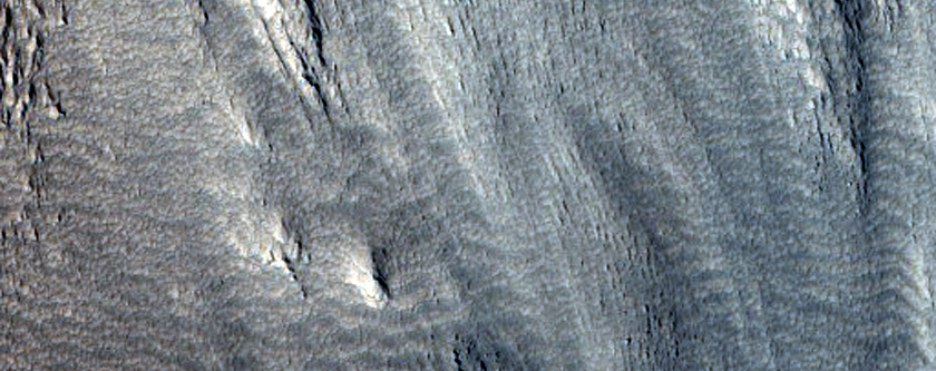 Multiple Curved Ridges at End of Valley in Protonilus Mensae
