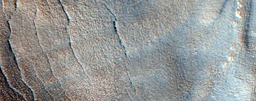 Pits in Valley on Rim of Moreux Crater
