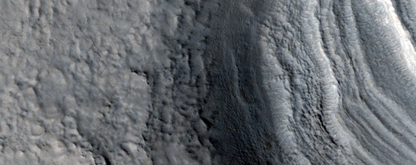 Layered Feature in Crater in Nilosyrtis Mensae
