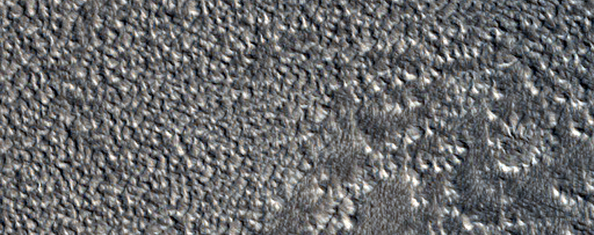 Flow Features in Erebus Montes
