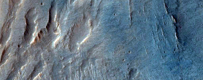 Transition between Thin Ius Chasma Landslides
