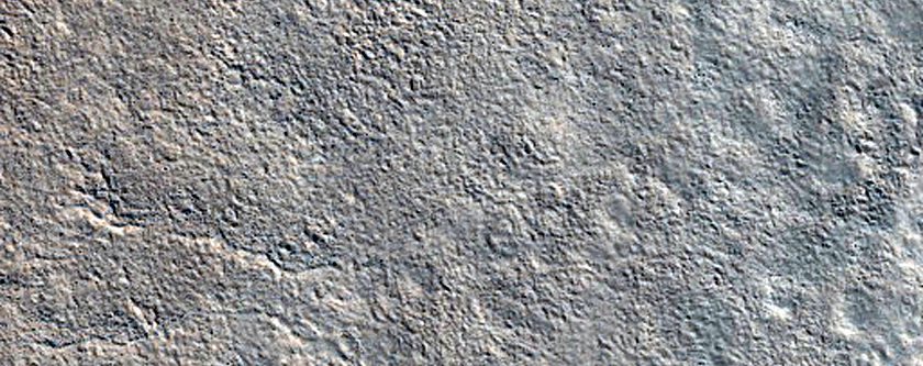 Dipping Layers in Crater Near Hrad Vallis
