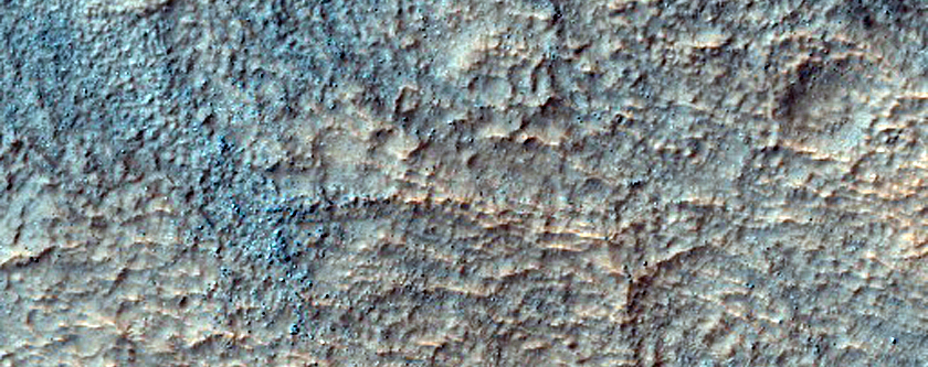 Possible Hydrated and Olivine-Bearing Deposits in Northwest Hellas Planitia
