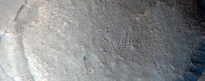 Mesa with Lobate Debris Flow South of Lyot Crater
