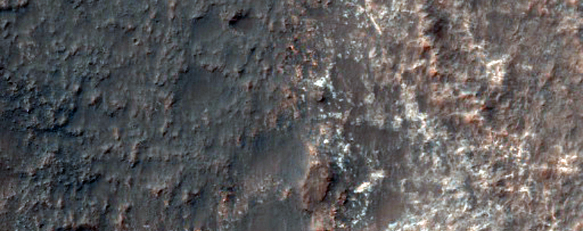 Light-Toned Outcrops in Simois Colles Basin 
