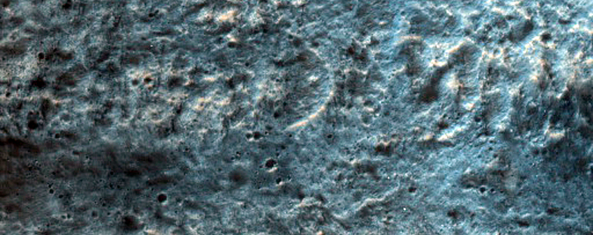 Possible Hydrated Silica-Rich Deposits on Floor of Crater
