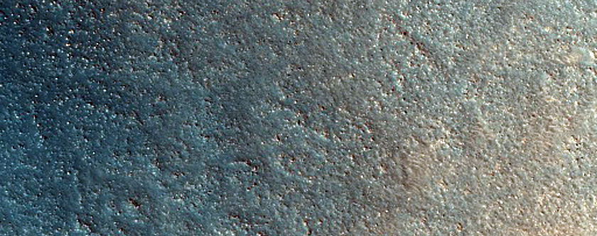 Possible Hydrated Minerals Associated with 21-Kilometer Crater Near Lyot
