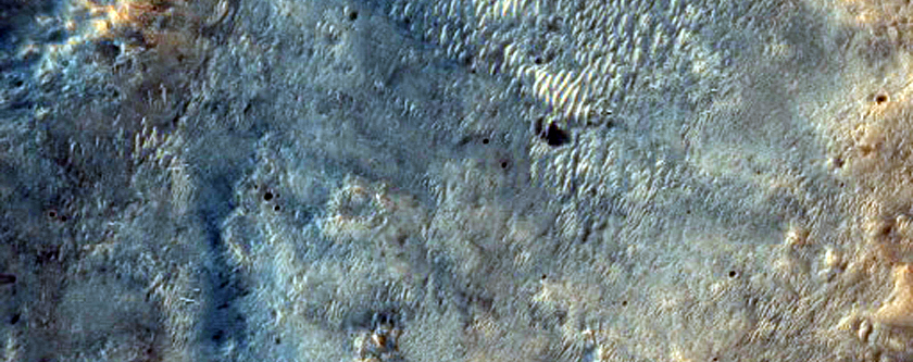 Contact between Crater and Possible Bedrock Exposures in Margaritifer Terra
