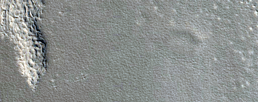 Pits Lined Up along Valley Wall in Protonilus Mensae
