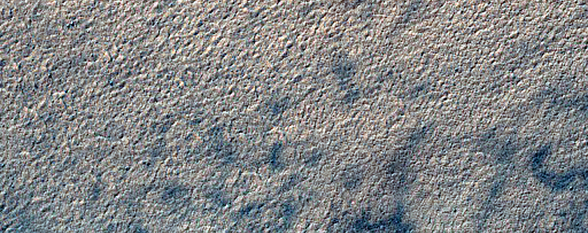 Mountain-Slope Landforms in Charitum Montes

