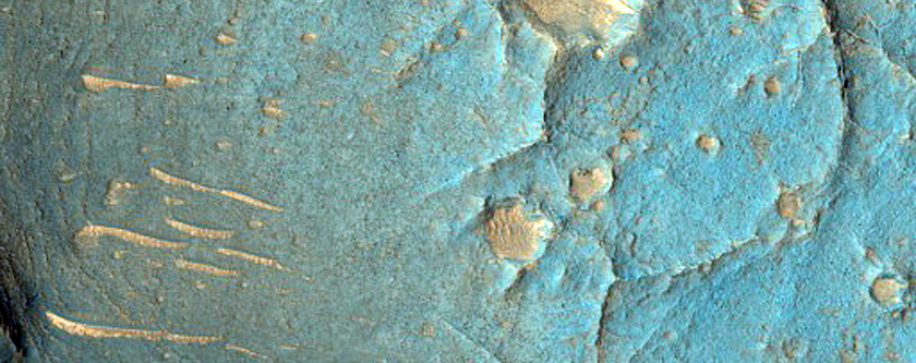 Inverted Features and Layers in Dia-Cau Crater