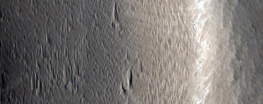 Channel and Fan Structure of Ceraunius Tholus

