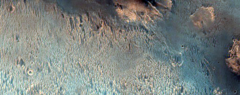 Degraded Crater Rim Morphology
