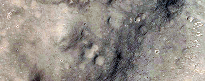 Phyllosilicates and Hydrated Silica in Crater Floor and Central Peak
