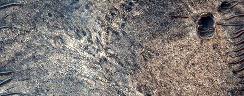 Light-Toned Deposits along Northern Melas Chasma Floor
