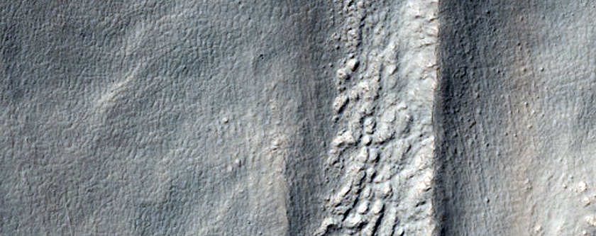 Flows and Layers in Promethei Terra
