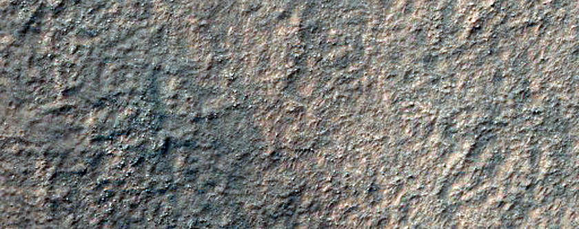 Possible Lowell Crater Ejecta on Floor of Slipher Crater
