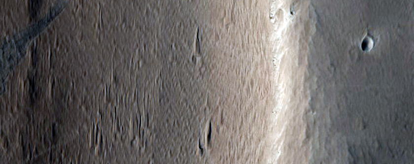 Channel and Fan Structure of Ceraunius Tholus
