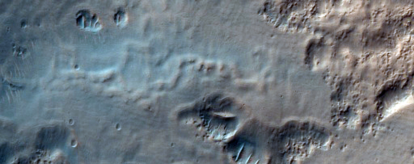 Pits on Crater Floor in Southern Mid-Latitudes
