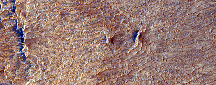 Interessant bodemreliëf op het aureool van Olympus Mons