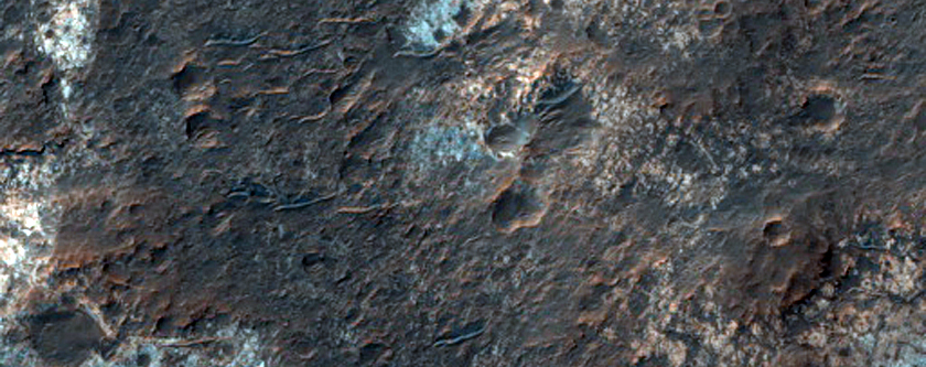 Предположительно, светлые слоистые силикаты земли Margaritifer Terra