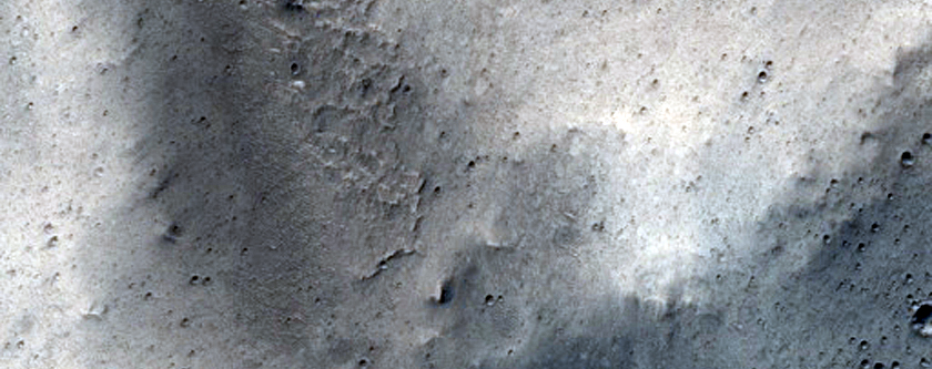 Pasted-on Material on Crater Ejecta
