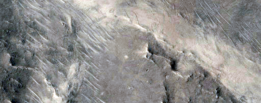 Sinuous Ridges and Valleys in Peridier Crater

