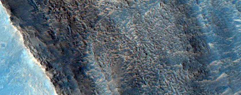 Cracks in and around Northern Mid-Latitude Craters

