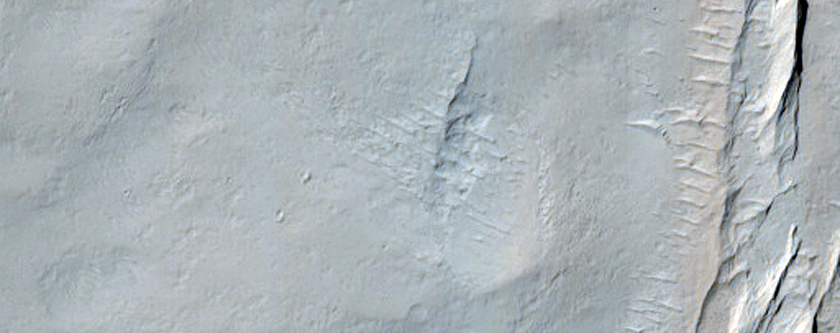 Contact between Apollinaris Patera and Medusae Fossae Formation  
