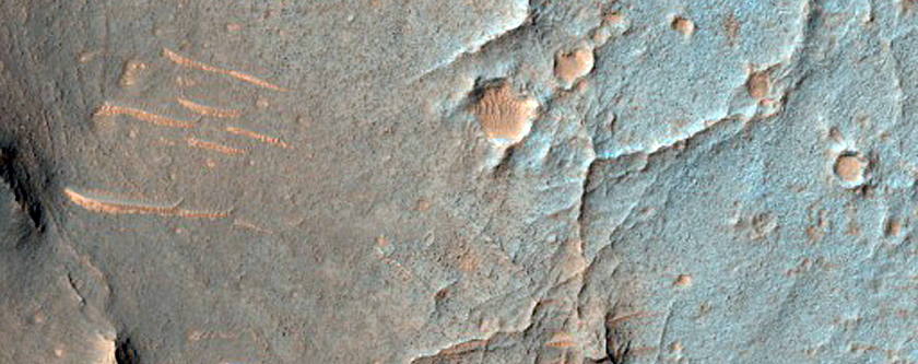 Inverted Features and Layers in Dia-Cau Crater