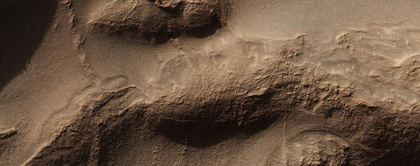Honeycomb-Textured Landforms in Northwestern Hellas Planitia