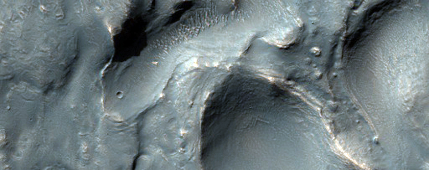 Crater in Claritas Fossae Region
