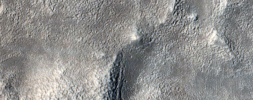 Two Exit Breaches in Young Crater
