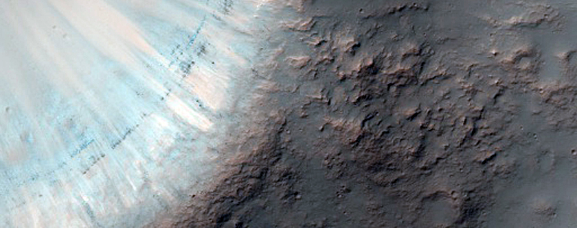 Crater on Rim of Larger Crater with Possible Phyllosilicate

