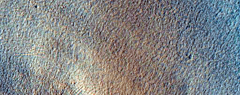 Pits and Cracks Near Moreux Crater
