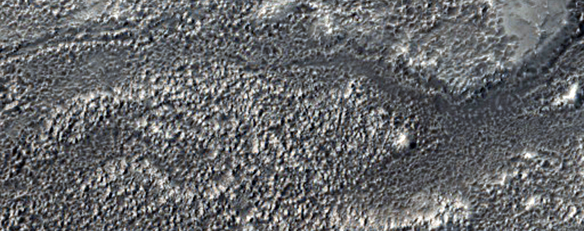 Channel Near Ejecta in Northern Mid-Latitudes
