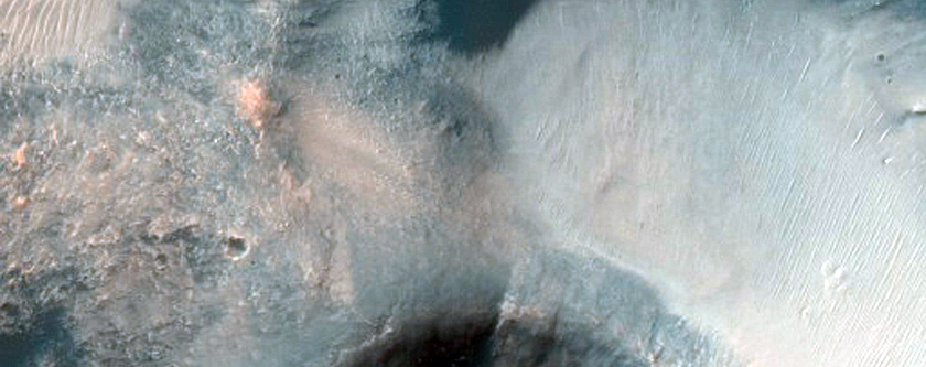 Monitor Crater Slopes in Margaritifer Terra
