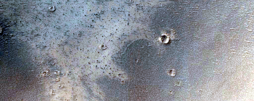 5-Kilometer Diameter Crater with Bright Material in Rim and Ejecta
