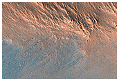 A Nine Kilometer Impact Crater and Its Central Peak