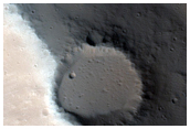 Elevated Filled-in Crater in Ceraunius Fossae Region
